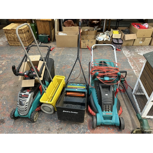 1039 - A collection of items to include Bosch Rotak 36 LI cordless lawnmower with battery and charger, Bosc... 