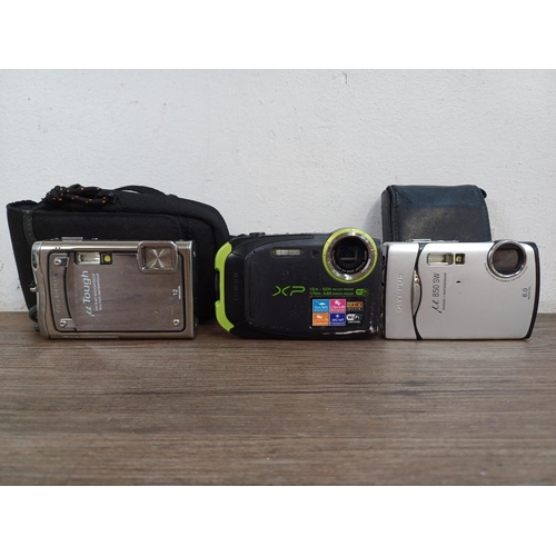 720 - Three shock/waterproof compact digital cameras, one Olympus µ 850 SW, one Olympus µ Tough-8000 12mp ... 