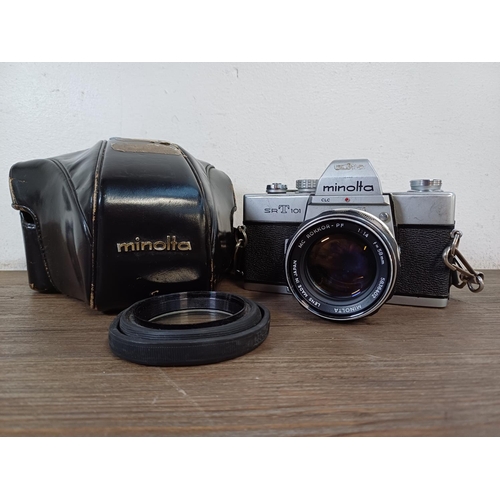 728 - A cased Minolta SRT101 35mm SLR camera fitted with MC Rokkor-PF 1:1.4 f=58mm lens