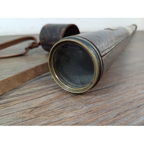 731 - A WWI brass and leather J.H. Steward military three-draw telescope stamped 'Broad arrow Sig. M.ID.15... 