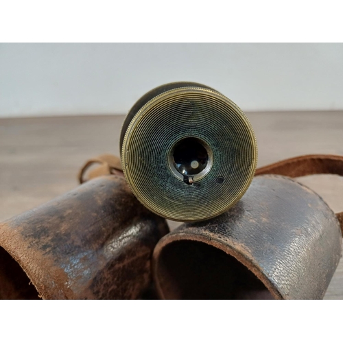 731 - A WWI brass and leather J.H. Steward military three-draw telescope stamped 'Broad arrow Sig. M.ID.15... 