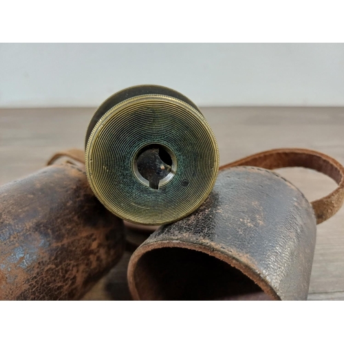 731 - A WWI brass and leather J.H. Steward military three-draw telescope stamped 'Broad arrow Sig. M.ID.15... 