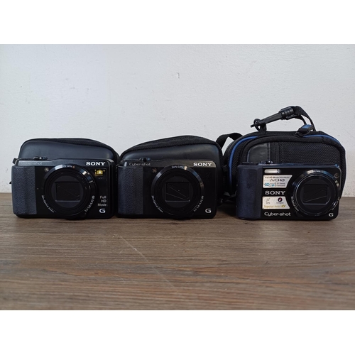 734 - Three cased Sony compact digital cameras, two DSC-HX20V 18.2mp and one DSC-HX7V 16.2mp