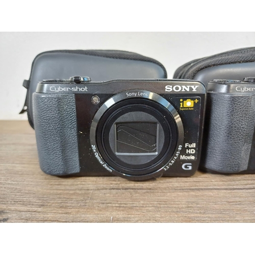 734 - Three cased Sony compact digital cameras, two DSC-HX20V 18.2mp and one DSC-HX7V 16.2mp