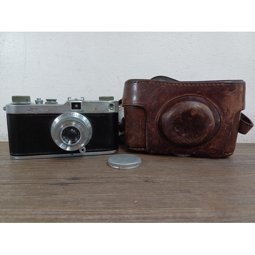 741 - A cased 1950s Meopta Opema II coupled rangefinder 35mm camera fitted with Belar 45/3.5 collapsible l... 