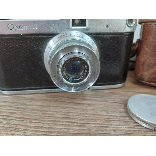 741 - A cased 1950s Meopta Opema II coupled rangefinder 35mm camera fitted with Belar 45/3.5 collapsible l... 