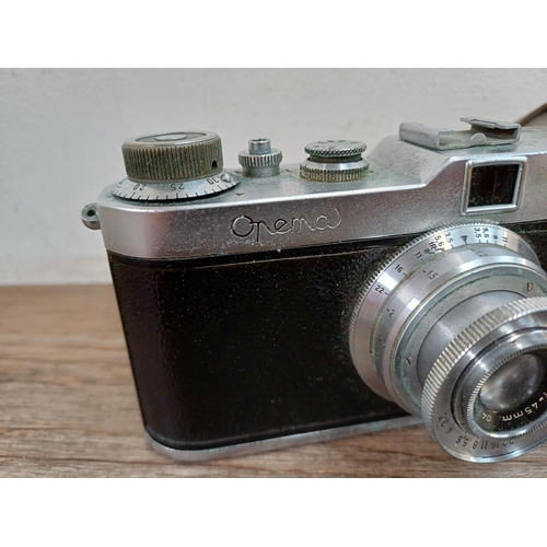 741 - A cased 1950s Meopta Opema II coupled rangefinder 35mm camera fitted with Belar 45/3.5 collapsible l... 