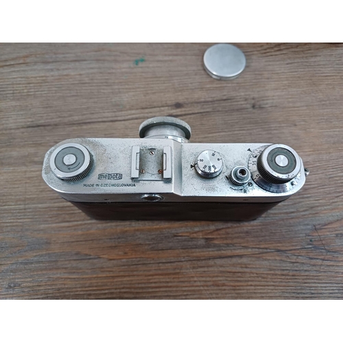 741 - A cased 1950s Meopta Opema II coupled rangefinder 35mm camera fitted with Belar 45/3.5 collapsible l... 