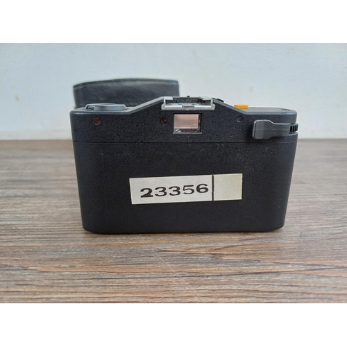 745 - A cased Minox 35 GT ultra-compact 35mm viewfinder camera