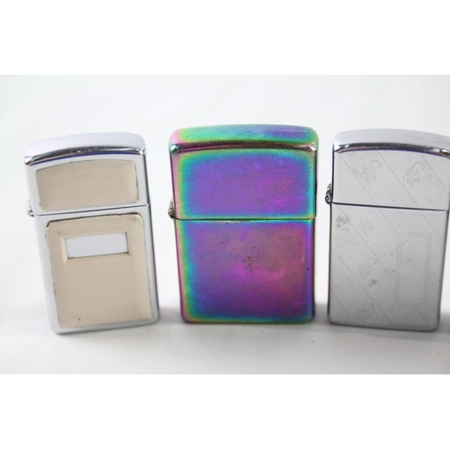 2393 - Six Zippo cigarette lighters to include 1980 Hedonist Yacht, 2010 Spectrum, 1999 Canada etc.