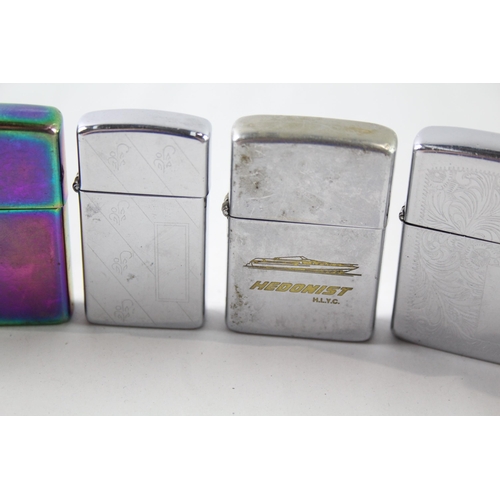 2393 - Six Zippo cigarette lighters to include 1980 Hedonist Yacht, 2010 Spectrum, 1999 Canada etc.