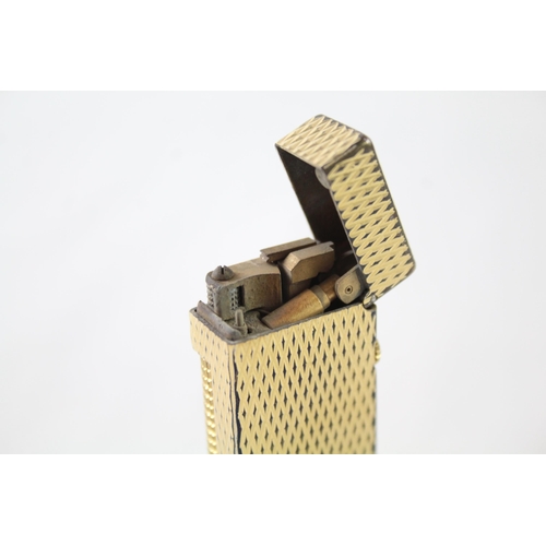 2395 - A vintage Dunhill Rollagas gold tone diamond texture cigarette lighter