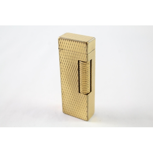 2396 - A vintage Dunhill Rollagas gold tone diamond texture cigarette lighter