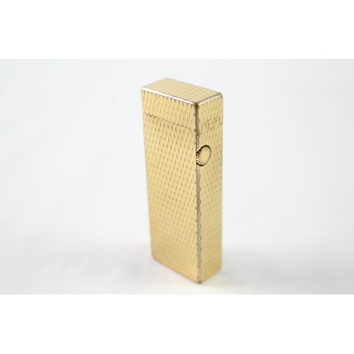 2396 - A vintage Dunhill Rollagas gold tone diamond texture cigarette lighter