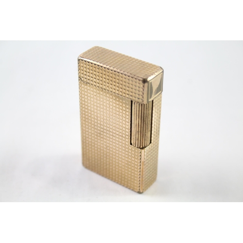 2397 - A vintage St Dupont Paris gold plated hobnail texture cigarette lighter