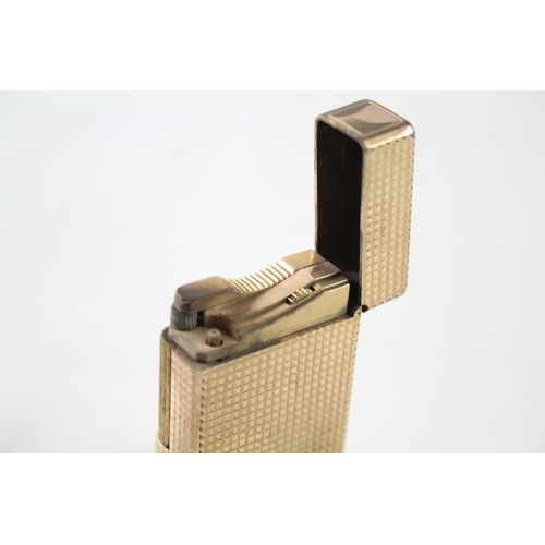 2397 - A vintage St Dupont Paris gold plated hobnail texture cigarette lighter