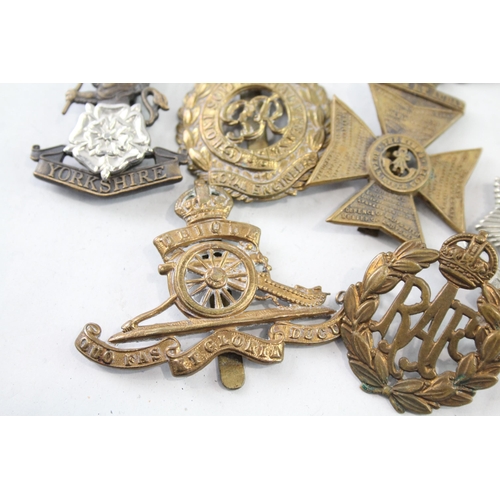 2402 - Nine military cap badges