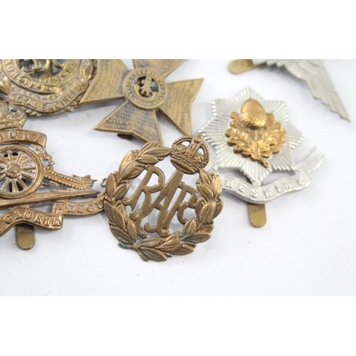 2402 - Nine military cap badges