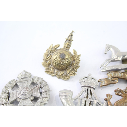 2403 - Ten military cap badges