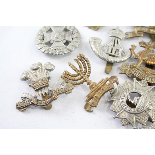 2403 - Ten military cap badges