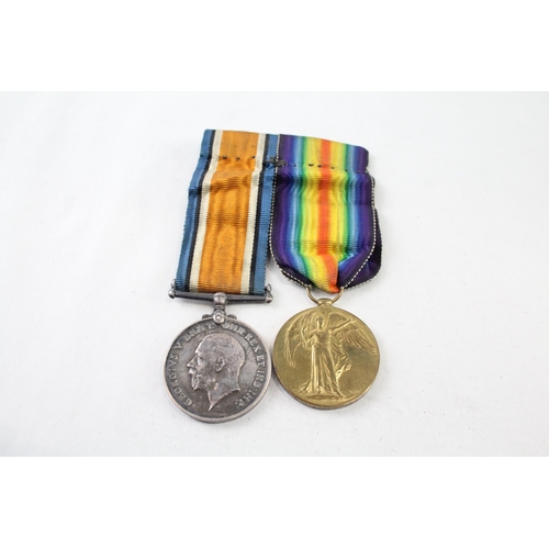 2404 - A WWI mounted medal pair presented to 47988 Pte. G.J. Amner Queen's Regt.