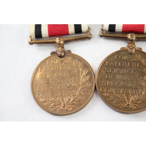 2406 - Four Police Service medals, three Special Constabulary - Charles E. Richardson, Leonard J. Richards ... 