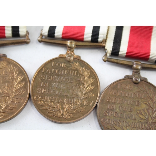 2406 - Four Police Service medals, three Special Constabulary - Charles E. Richardson, Leonard J. Richards ... 