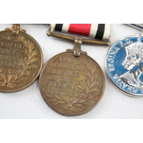 2406 - Four Police Service medals, three Special Constabulary - Charles E. Richardson, Leonard J. Richards ... 