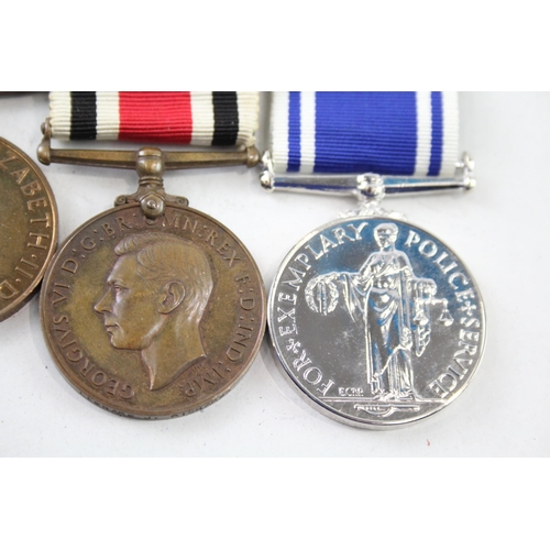 2406 - Four Police Service medals, three Special Constabulary - Charles E. Richardson, Leonard J. Richards ... 