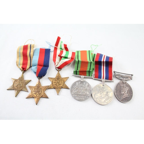 2410 - A WWII medal group to include Territorial medal presented to Pte. Berwick