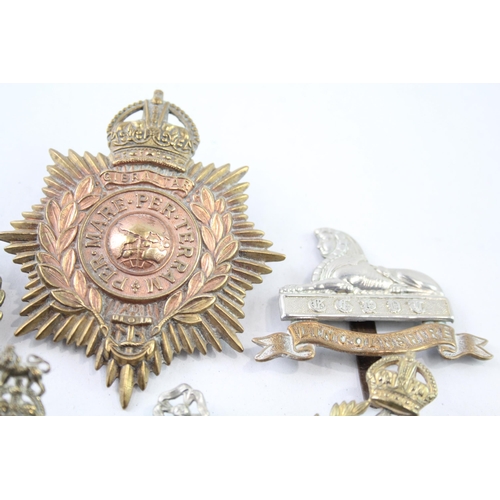 2411 - Ten military cap badges