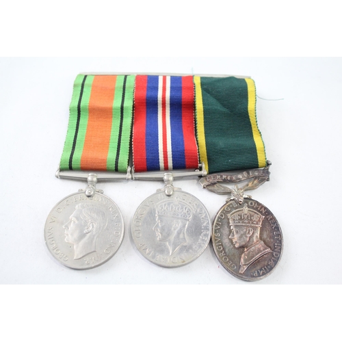 2412 - A WWII mounted medal group to include Territorial medal presented to 4803046 Dvr. J. Wood R.E.M.E. e... 