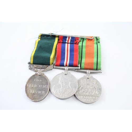 2412 - A WWII mounted medal group to include Territorial medal presented to 4803046 Dvr. J. Wood R.E.M.E. e... 