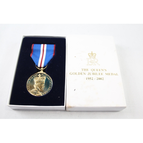 2413 - A boxed Elizabeth II The Queen's Golden Jubilee medal with certificate of authenticity