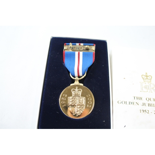 2413 - A boxed Elizabeth II The Queen's Golden Jubilee medal with certificate of authenticity