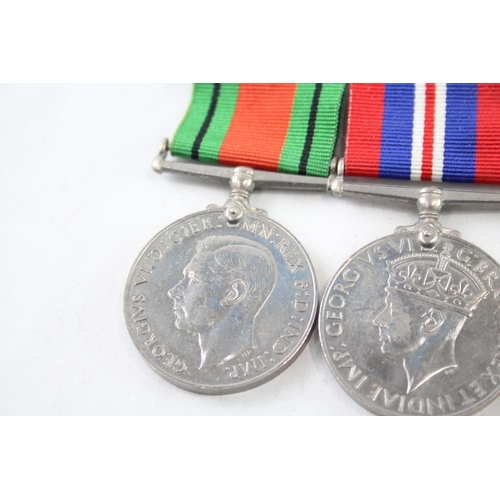 2423 - Two mounted medal groups, one comprising Order of St. John Long Service, Civil Defence Service and T... 