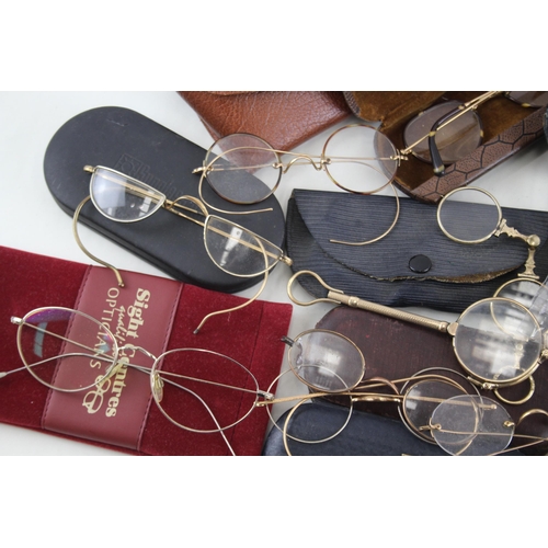 527 - A collection of vintage spectacles