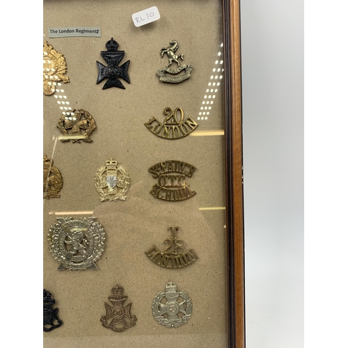 2434 - Eighteen framed London Regiments military cap badges