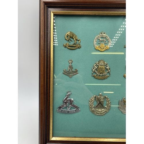 2440 - Nine framed Scottish Regiment military cap badges