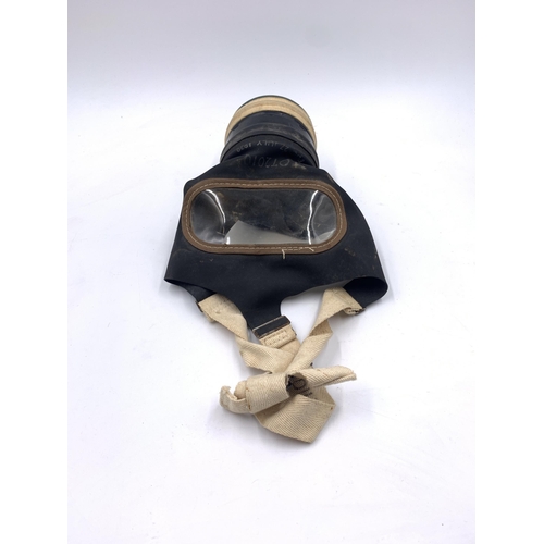 2444 - A boxed WWII civilian gas mask, dated 1939