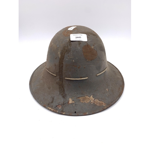 2445 - A WWII civilian pattern Zuckerman steel military helmet