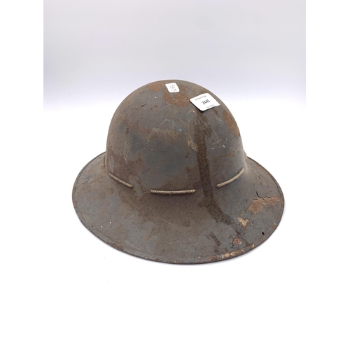 2445 - A WWII civilian pattern Zuckerman steel military helmet