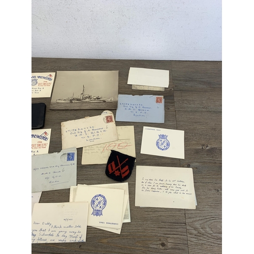 2447 - A collection of WWII ephemera relating to LT/JX 340232 Ord. Sig. G.A. Burrow of The H.M.S. Birch to ... 