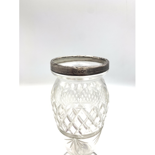 2380 - Two pieces of cut glassware with hallmarked sterling silver tops, one cranberry jar and one clear fo... 