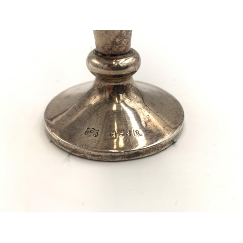 2384 - A hallmarked Birmingham silver weighted bud vase, dated 1918 - approx. gross weight 79g and 12cm hig... 