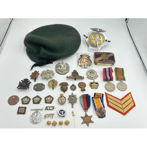 2448 - A collection of mostly militaria to include WWI British War medal presented to 38911 Pte. J. Turley ... 