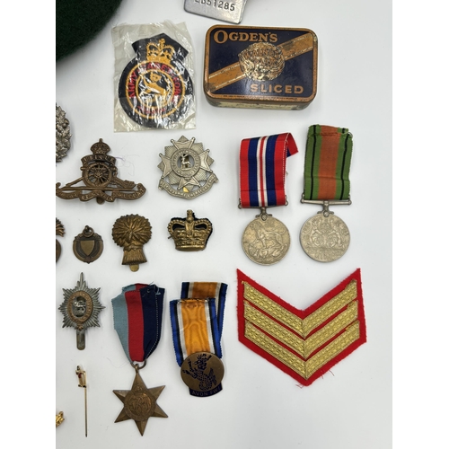 2448 - A collection of mostly militaria to include WWI British War medal presented to 38911 Pte. J. Turley ... 