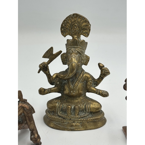 2462 - Three Hindu deity figurines, one brass and two copper - largest approx. 8.5cm