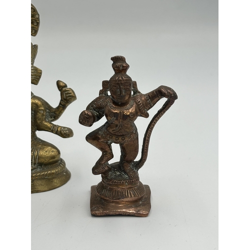 2462 - Three Hindu deity figurines, one brass and two copper - largest approx. 8.5cm