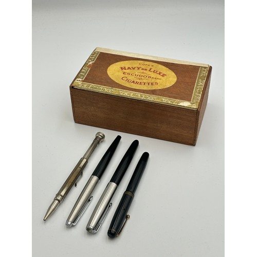 2461 - Four writing instruments, one silver plated propelling pencil and three Parker fountain pens to incl... 